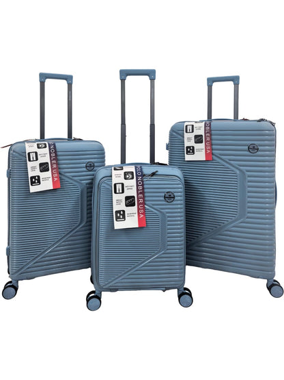 Set of three blue suitcases with tags on a white background